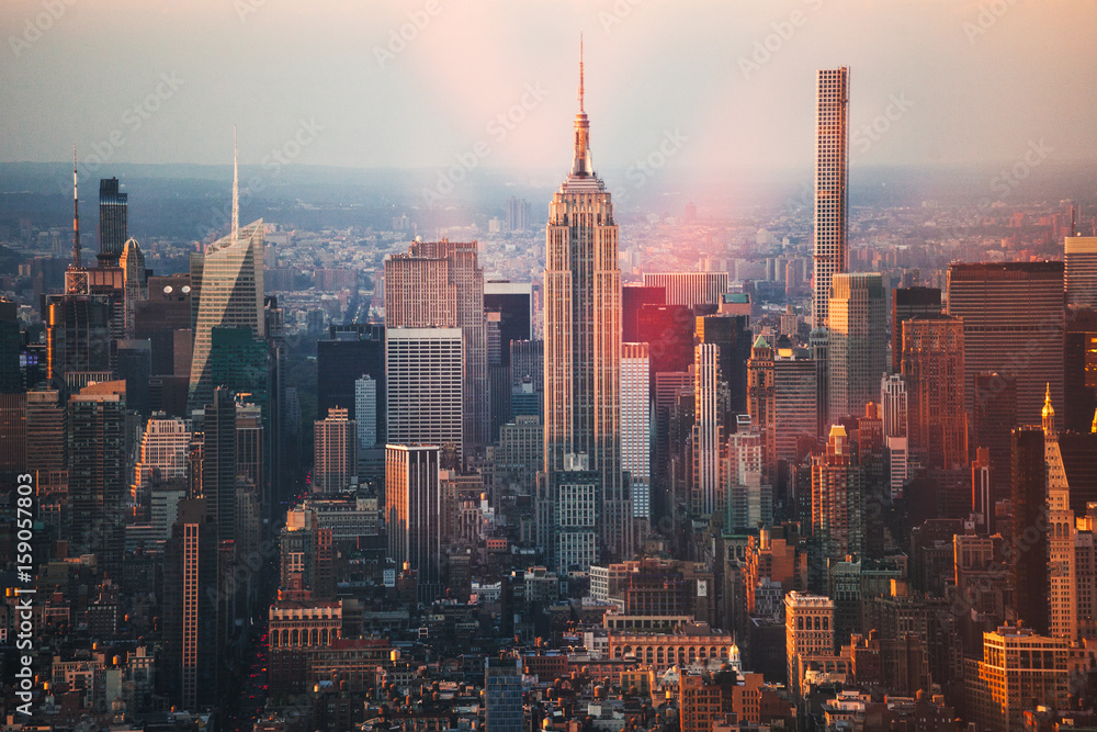Views of Manhattan skyline at sunset